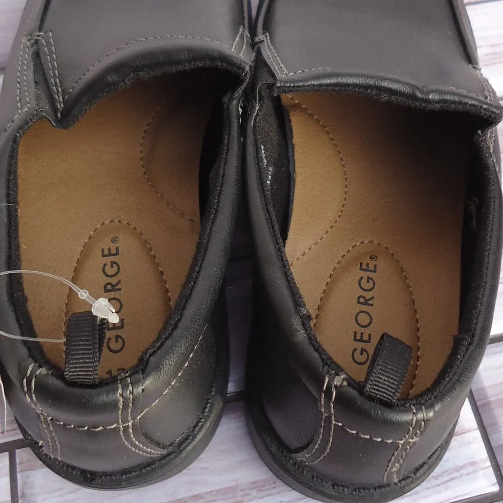 NWT. SIZE 13. George black slip-on formal /dress shoes.